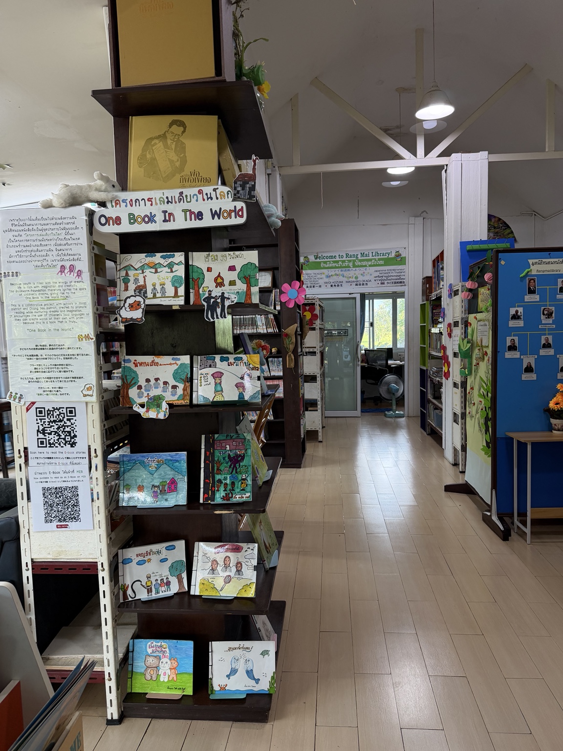 Books and illustrated stories inside Rang Mai Library.