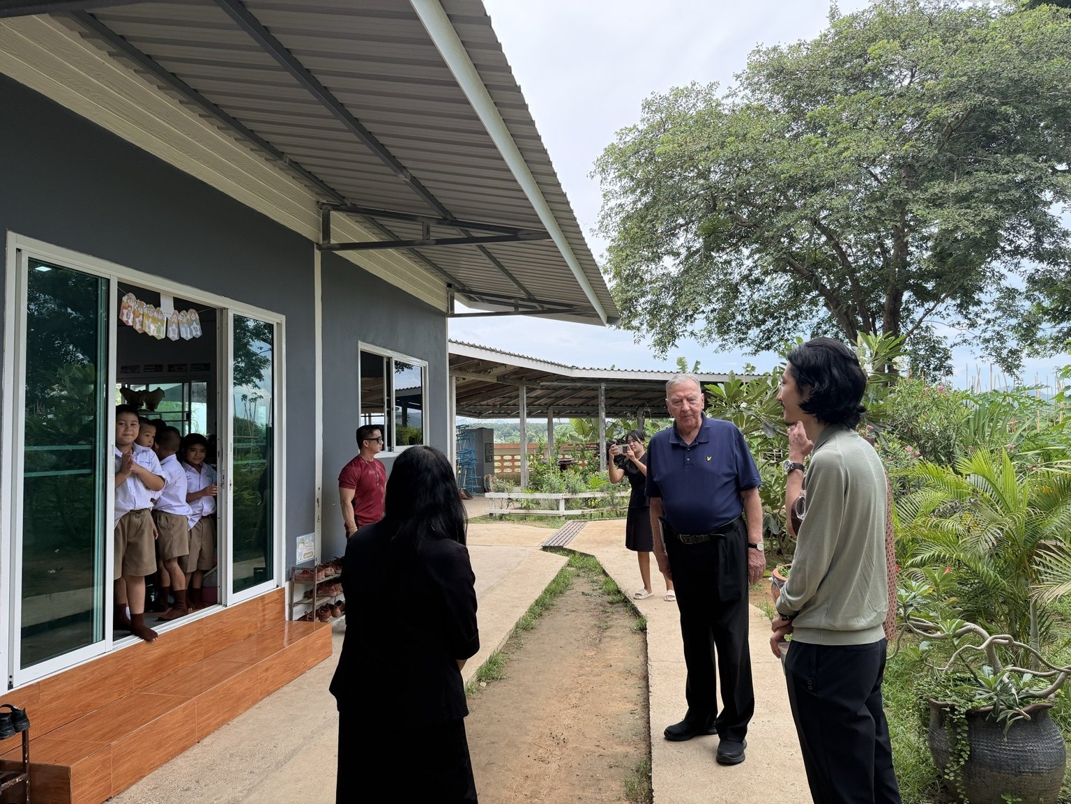 Visiting the school grounds and classrooms.